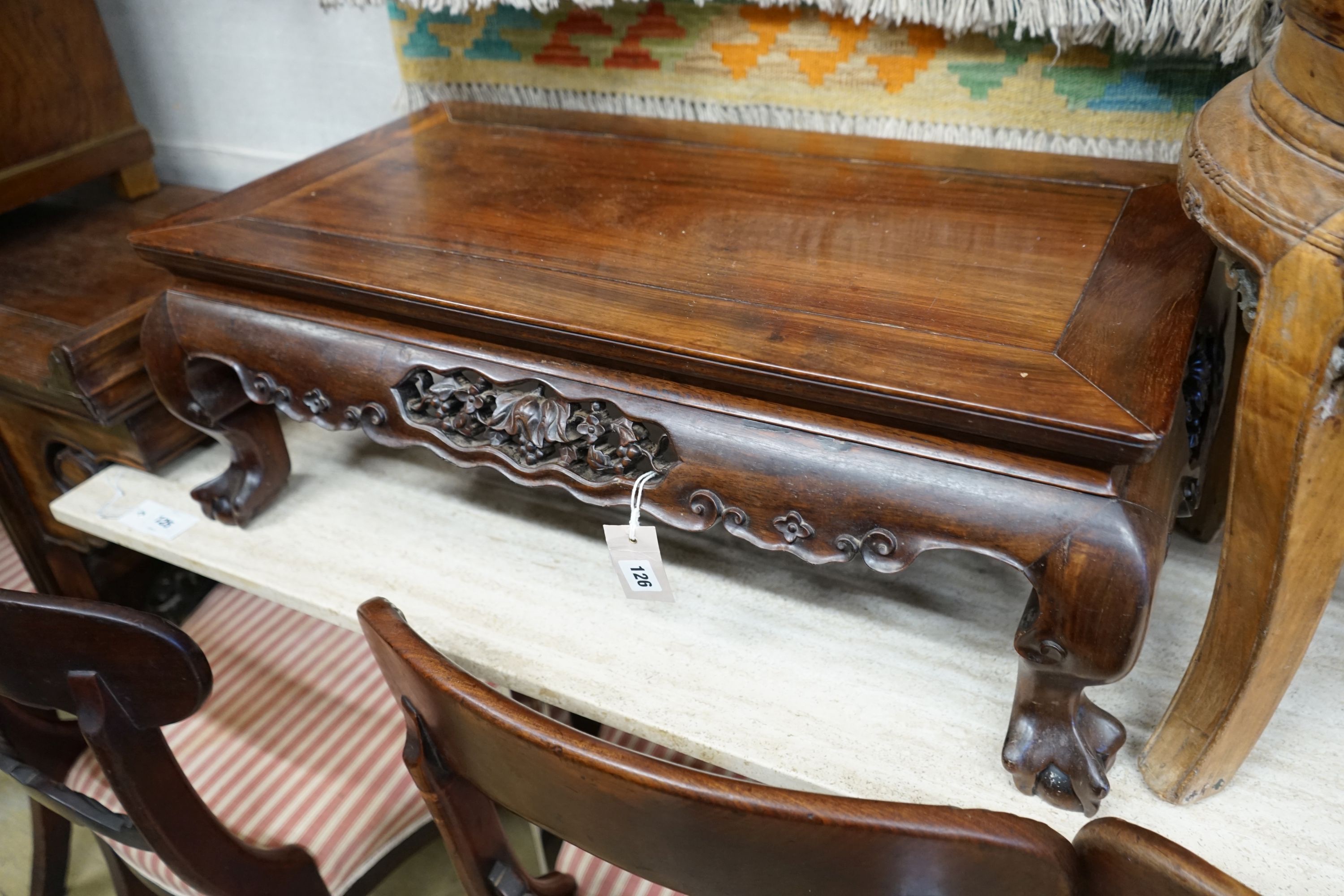 A Chinese hongmu Kang table, 19th century, 79 cm long, 43 cm wide, 27 cm high, old repairs